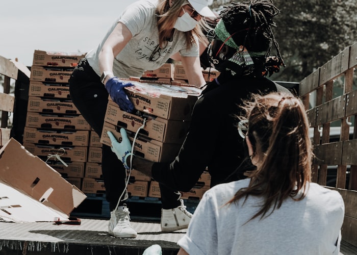 HCASSC field workers helping community members in West Africa